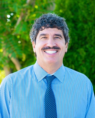 Dr. Tom A. Stamas